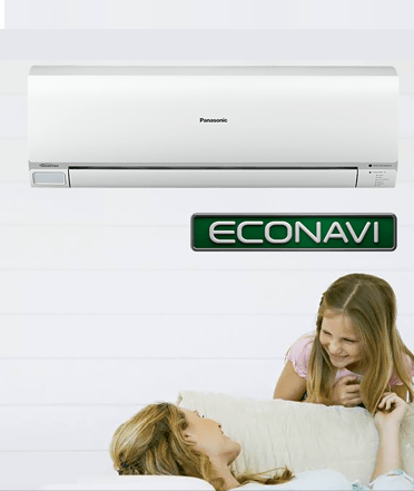 Mother and daughter lying in sofa near Panasonic air conditioner
