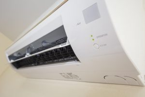Close up of a split system air conditioner on white wall
